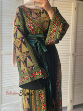 Lavish Black and Green Thob Dress with Detachable Back Skirt and Head Scarf